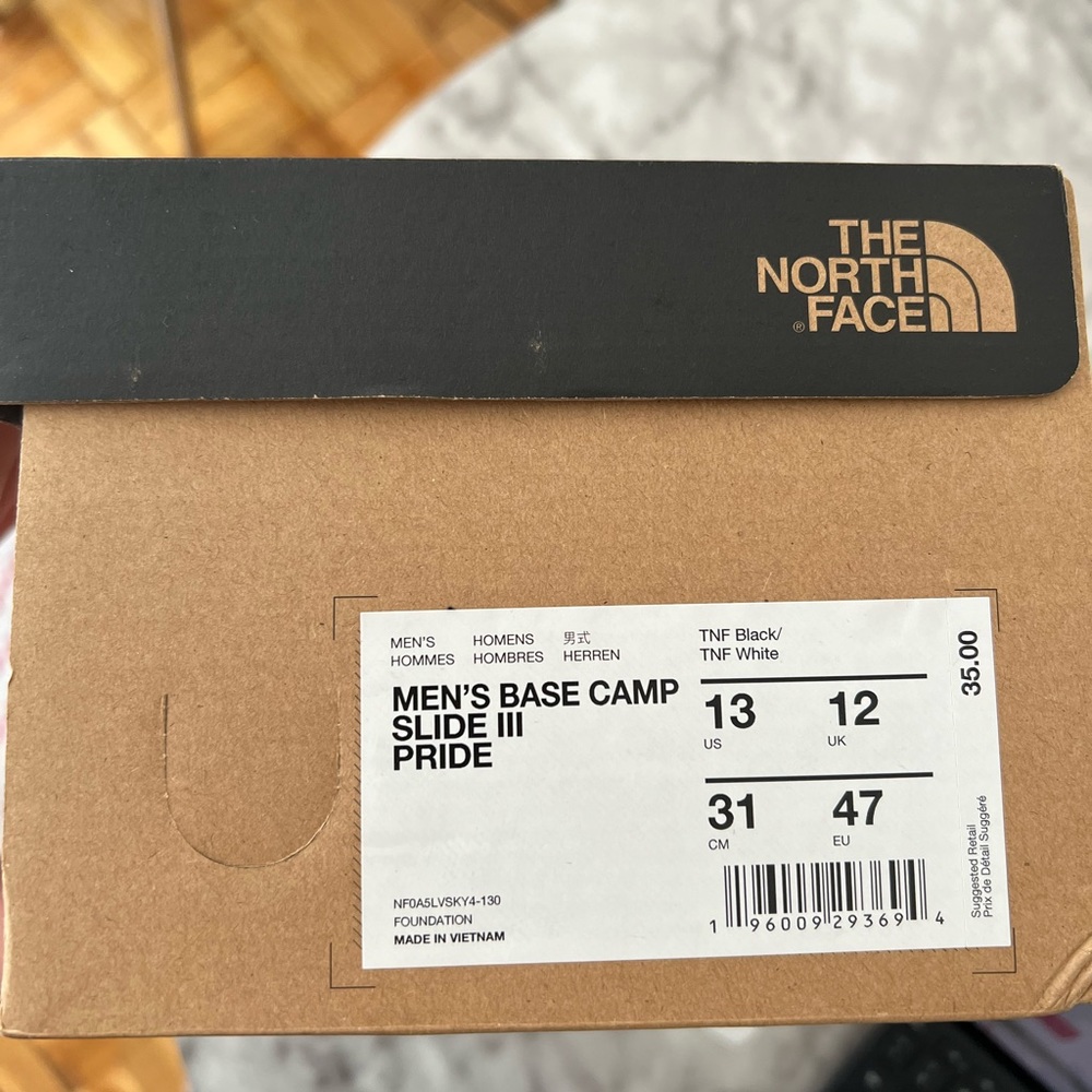 The north face men's camp slide size 13. brand new, never worn.